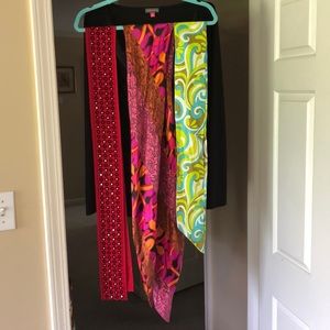 Three oblong silky scarves.